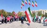 آیین اهتزاز پرچم مقدس جمهوری اسلامی ایران در دانشکده علوم قرآنی شیراز